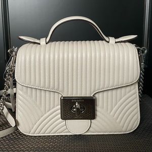 Coach cassidy top handle crossbody or shoulder bag with art deco quilting.